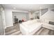 Spacious finished basement featuring neutral tones, modern flooring, and ample seating at 6064 Bartley Dr, Noblesville, IN 46062