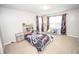 bedroom with carpet, window, and decor at 6064 Bartley Dr, Noblesville, IN 46062