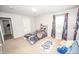 bedroom with carpet, window, and decor at 6064 Bartley Dr, Noblesville, IN 46062