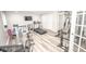 Home Gym featuring treadmill, stationary bike, and universal weight machine at 6064 Bartley Dr, Noblesville, IN 46062