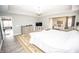 Spacious main bedroom featuring a sitting area and stylish decor at 6064 Bartley Dr, Noblesville, IN 46062