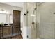 Modern bathroom featuring walk-in shower with glass door, vanity, and granite countertops at 6153 Dugan Dr, Whitestown, IN 46075
