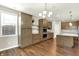 Open concept kitchen with stainless steel appliances, a large island, and ample cabinet space at 6153 Dugan Dr, Whitestown, IN 46075