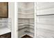 Walk-in pantry with ample wire shelving providing lots of storage at 6153 Dugan Dr, Whitestown, IN 46075
