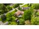 Aerial view of a home featuring a backyard, complete with a shed and lush trees at 6938 Rio Grande Dr, Indianapolis, IN 46217