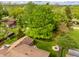 Lush backyard featuring a well-maintained lawn, fire pit and playset at 6938 Rio Grande Dr, Indianapolis, IN 46217