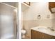 Standard bathroom featuring a glass-enclosed shower and a vanity with a white countertop at 6938 Rio Grande Dr, Indianapolis, IN 46217