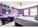 Bedroom featuring a bed, carpet, windows, and a desk area for studying or hobbies at 6938 Rio Grande Dr, Indianapolis, IN 46217