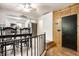 Dining room with black chairs offering kitchen views at 6938 Rio Grande Dr, Indianapolis, IN 46217