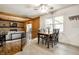 Open-concept dining room with natural light and views into the living room at 6938 Rio Grande Dr, Indianapolis, IN 46217