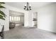Open-concept dining area with views into the living room and kitchen at 6938 Rio Grande Dr, Indianapolis, IN 46217