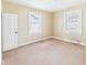 A simple bedroom featuring neutral walls, and carpet floors at 717 E 27Th St, Anderson, IN 46016