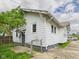 Exterior view of the home and yard at 717 E 27Th St, Anderson, IN 46016
