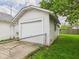 View of the detached one car garage at 717 E 27Th St, Anderson, IN 46016