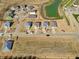 New homes under construction in a planned community with ponds and green spaces at 7509 Big Bend Blvd, Camby, IN 46113