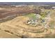 Aerial view of homes in a residential community with ponds and open fields in the background at 7509 Big Bend Blvd, Camby, IN 46113