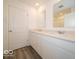 Bathroom with double vanity, quartz countertops and modern fixtures at 7509 Big Bend Blvd, Camby, IN 46113