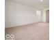 Neutral bedroom with a window letting in lots of natural light at 7509 Big Bend Blvd, Camby, IN 46113