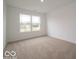 Bright bedroom with neutral carpet and a window at 7509 Big Bend Blvd, Camby, IN 46113