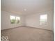 Expansive bedroom with plush carpeting and two large windows offering bright, natural light at 7509 Big Bend Blvd, Camby, IN 46113
