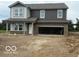 New two-story home featuring a two-car garage and neutral-colored exterior at 7509 Big Bend Blvd, Camby, IN 46113