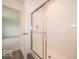 Shower with glass sliding doors at 7509 Big Bend Blvd, Camby, IN 46113