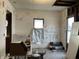 Bedroom view with exposed walls and ceiling and drawings on the walls at 802 S Anderson St, Elwood, IN 46036