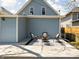 Inviting back patio featuring a seating area, perfect for relaxation and outdoor gatherings at 809 N Temple Ave, Indianapolis, IN 46201