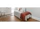 Comfortable bedroom setting with natural light and light colored walls at 809 N Temple Ave, Indianapolis, IN 46201