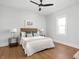 Bright bedroom features a ceiling fan, natural light, and stylish decor for a comfortable and inviting space at 809 N Temple Ave, Indianapolis, IN 46201