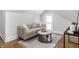 Cozy living area with natural light, neutral tones, and modern decor enhances the attic space at 809 N Temple Ave, Indianapolis, IN 46201