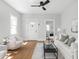 Bright living room features hardwood floors, neutral decor, and modern furnishings for comfortable and stylish living at 809 N Temple Ave, Indianapolis, IN 46201