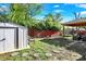 The backyard includes a shed and patio at 8103 Laughlin Dr, Indianapolis, IN 46219
