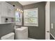 A full bathroom with updated fixtures at 8103 Laughlin Dr, Indianapolis, IN 46219