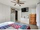 This bedroom includes storage and television at 8103 Laughlin Dr, Indianapolis, IN 46219