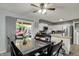 Modern kitchen features white cabinetry, stainless steel appliances, a stylish backsplash, and butcher block island at 8103 Laughlin Dr, Indianapolis, IN 46219
