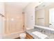 Bathroom with tub-shower combo and granite countertop at 8108 Amarillo Dr, Indianapolis, IN 46237