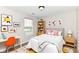 bedroom with playful decor, a large window, and a colorful rug at 8108 Amarillo Dr, Indianapolis, IN 46237
