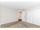 Neutral bedroom includes plush carpet and double closets at 8108 Amarillo Dr, Indianapolis, IN 46237