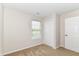Bright bedroom with a neutral color, carpeted floor, and closet near the door at 8108 Amarillo Dr, Indianapolis, IN 46237