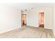 Neutral bedroom offers plush carpet with ensuite baths on either side of the room at 8108 Amarillo Dr, Indianapolis, IN 46237