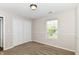 Bedroom featuring a window, plush carpet, and a closet at 8108 Amarillo Dr, Indianapolis, IN 46237