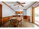 View of eat-in kitchen and dining area featuring wood cabinets and wood table at 818 Merry Ln, Greenwood, IN 46142