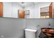 Powder room featuring a decorative vessel sink at 818 Merry Ln, Greenwood, IN 46142