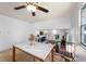 Bright dining area on the upper level with a modern table and a view of the lower living area at 8227 Hoover Ln, Indianapolis, IN 46260