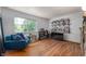 Inviting living room with natural light and bookshelf storage at 8227 Hoover Ln, Indianapolis, IN 46260
