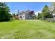 Well-maintained backyard featuring a lush green lawn and a charming gazebo at 8627 Lansdowne Dr, Fishers, IN 46038