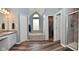 Elegant bathroom with a soaking tub, walk-in shower, and a stylish vanity at 8627 Lansdowne Dr, Fishers, IN 46038