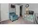 Bedroom showcasing a blue chair and built-in storage shelves at 8627 Lansdowne Dr, Fishers, IN 46038