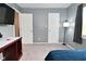 Bedroom with modern decor, carpet, and natural light from the window at 8627 Lansdowne Dr, Fishers, IN 46038